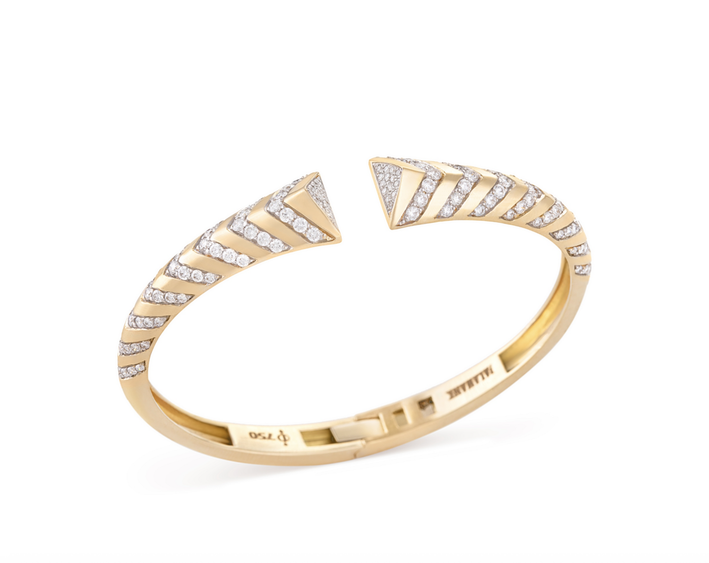 Falamank’s yellow gold Modern Bangle, set with diamonds.