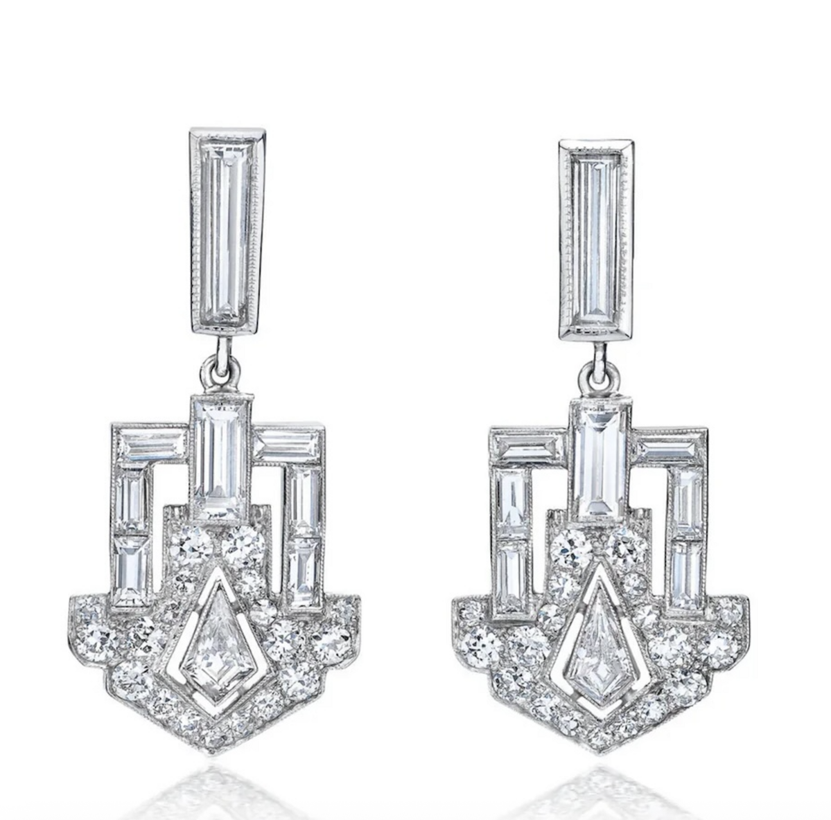 Mindi Mond’s platinum Dangling Deco Shield Earrings, featuring mixed-cut diamonds.